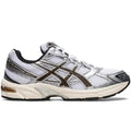 ASICS GEL-1130 White Clay Canyon 1201A256-113 lateral side profile showing white mesh upper, metallic silver overlays, deep brown Clay Canyon tiger stripes, black collar lining, and pre-aged sail midsole with bronze GEL window