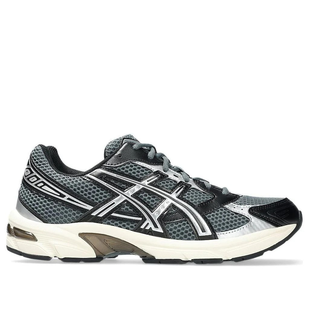 ASICS Gel-1130 Steel Grey Black side profile view showing grey mesh upper silver stripes and cream midsole 