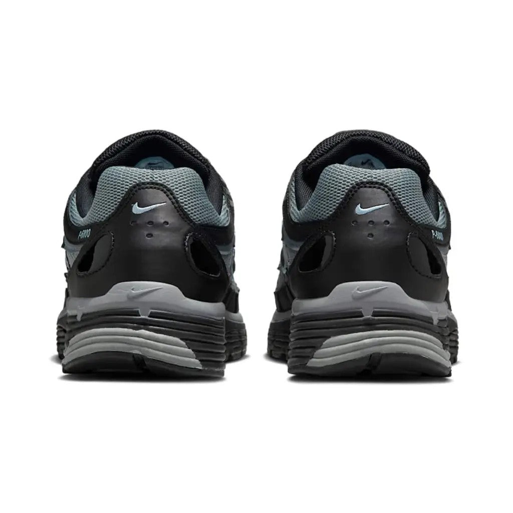 Nike P-6000 Black Cool Grey heel view showing white Swoosh on black heel panel grey mesh collar and two-tone grey midsole