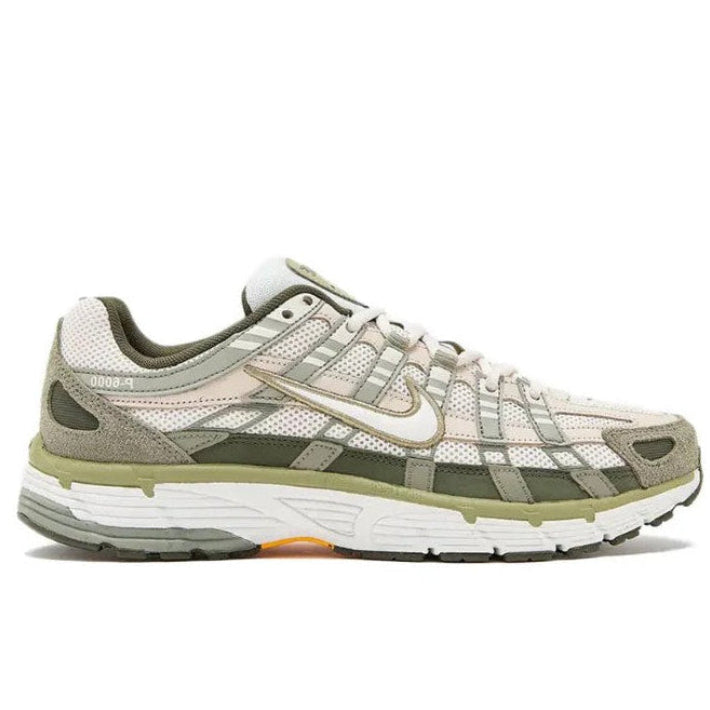 Nike P-6000 Cargo Khaki lateral side profile on white background showing white mesh upper, hairy olive suede mudguard, khaki overlays, outlined Swoosh, and white midsole with orange outsole accent