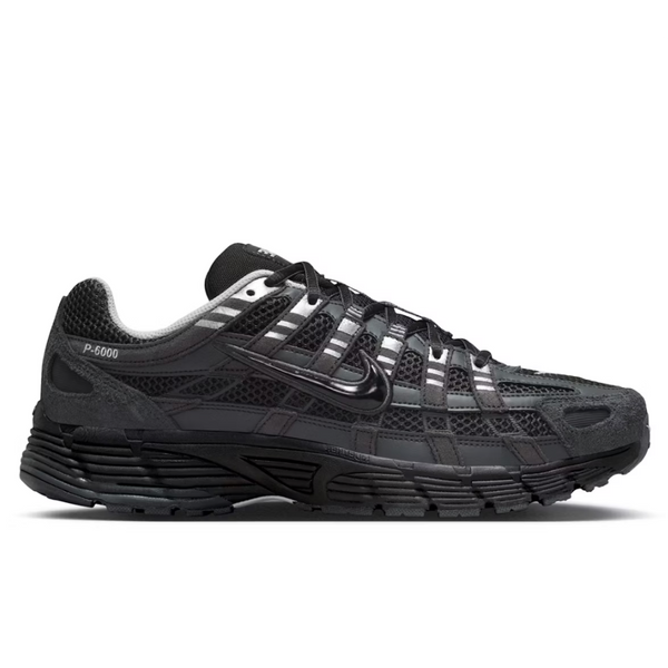 Nike P-6000 Suede Anthracite Metallic Silver lateral side profile on white background showing anthracite suede overlays, black Swoosh, metallic silver accents, and layered midsole