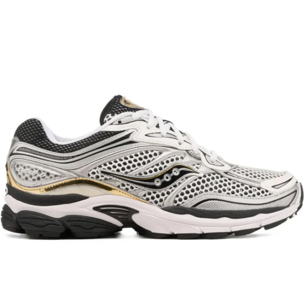 Side profile of the Saucony ProGrid Omni 9 White Black Gold (S70739-9), highlighting the layered Y2K technical upper, classic Saucony branding, and visible ProGrid midsole.