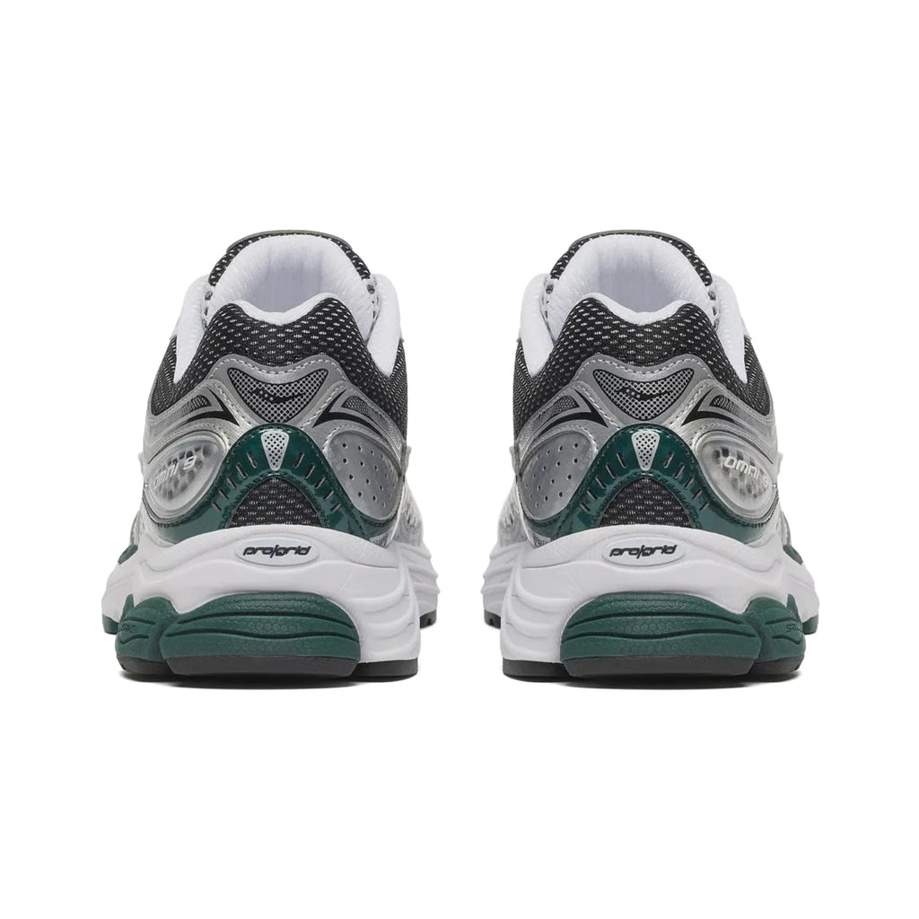 Saucony ProGrid Omni 9 White Pine Green rear heel view showing Omni 9 branding silver heel counter pine green cushioning panel ProGrid logo on white midsole and dark mesh collar on white background