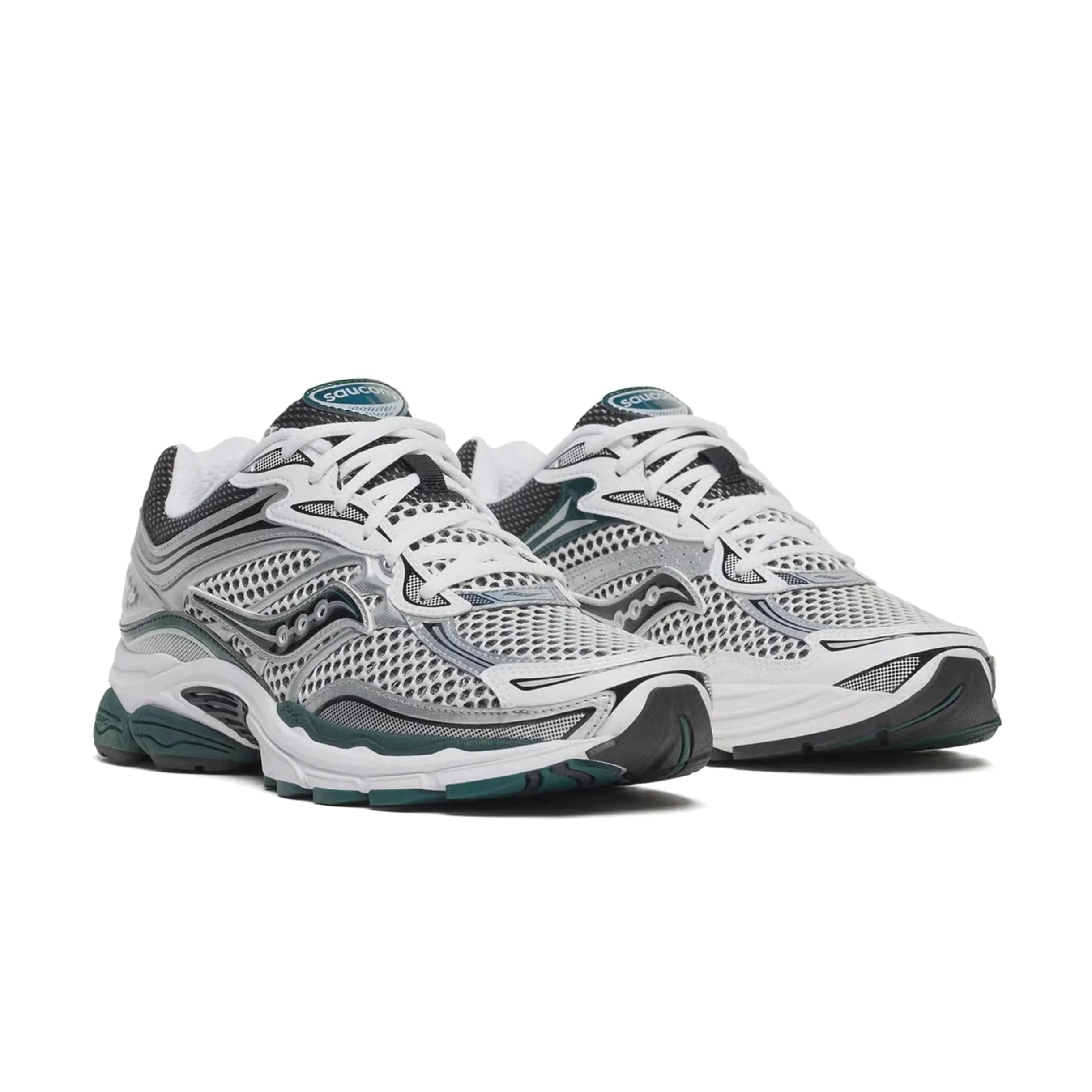 Saucony ProGrid Omni 9 White Pine Green pair front three-quarter angle showing white hexagonal mesh upper silver synthetic overlays Saucony tongue branding and pine green outsole on white background

